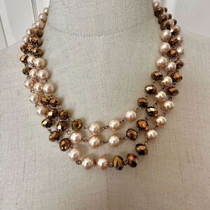 Faux pearl gold tone long beaded necklace